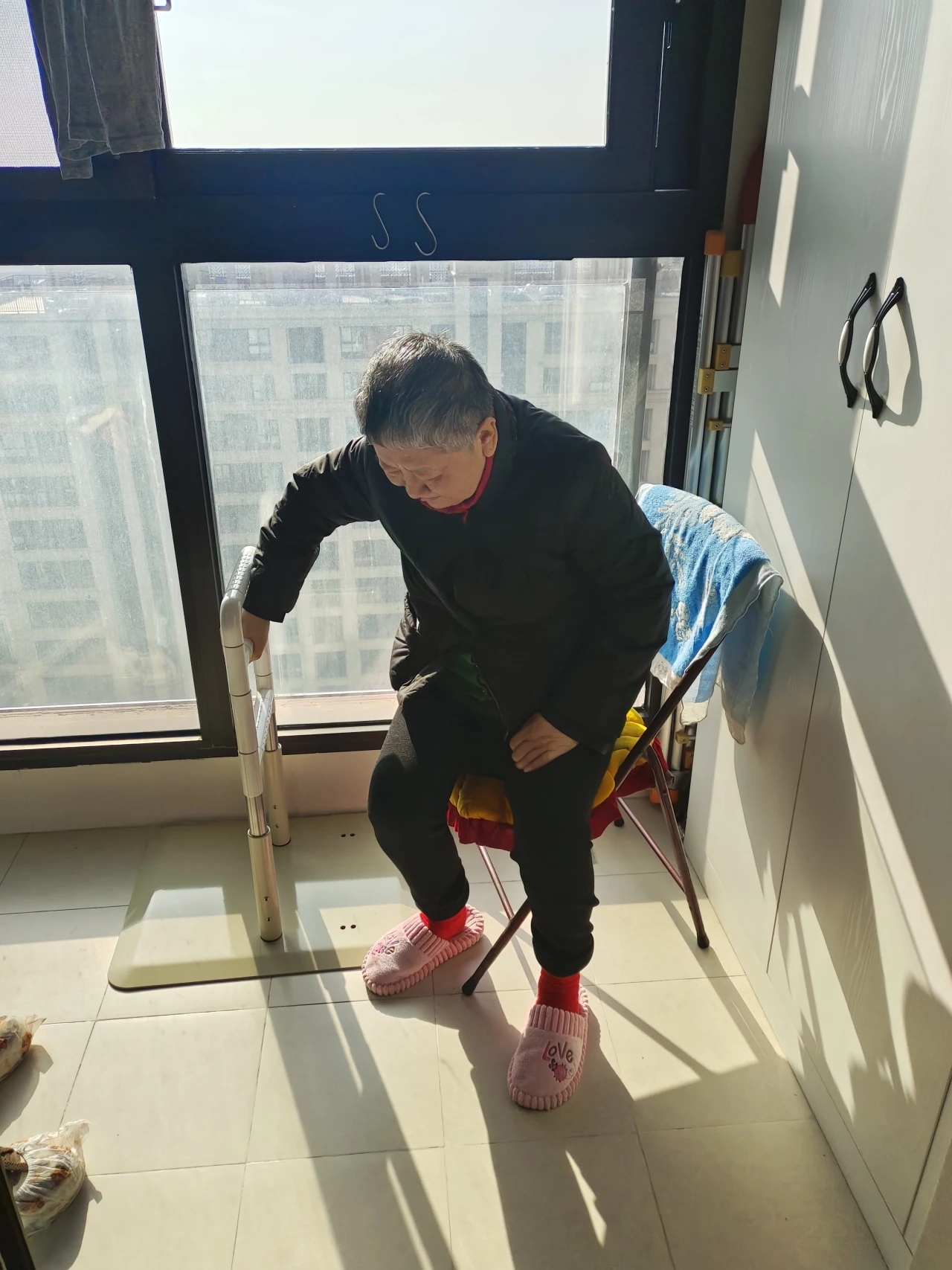 Elderly using safety handrails